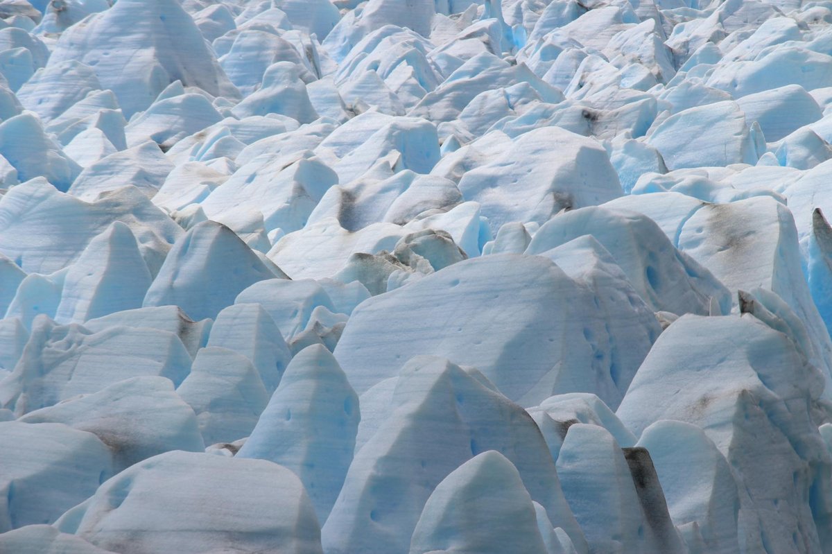 Close-up view of blue glacier ice formations in Chilean Patagonia