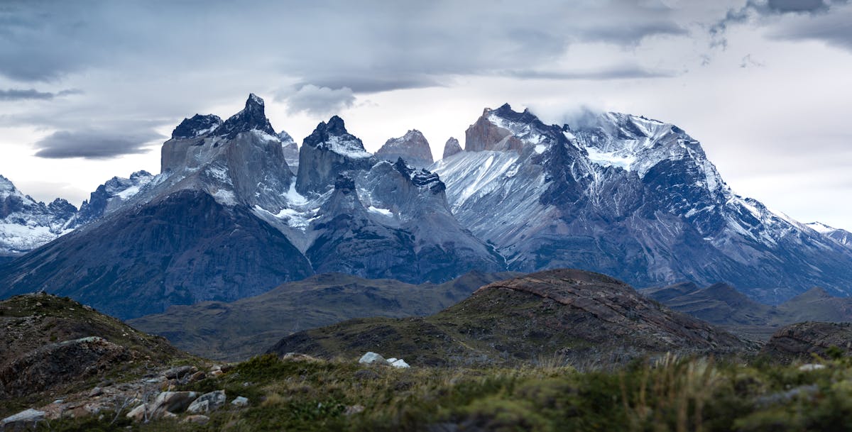 Mountain landscape in Torres del Paine National Park with dramatic clouds