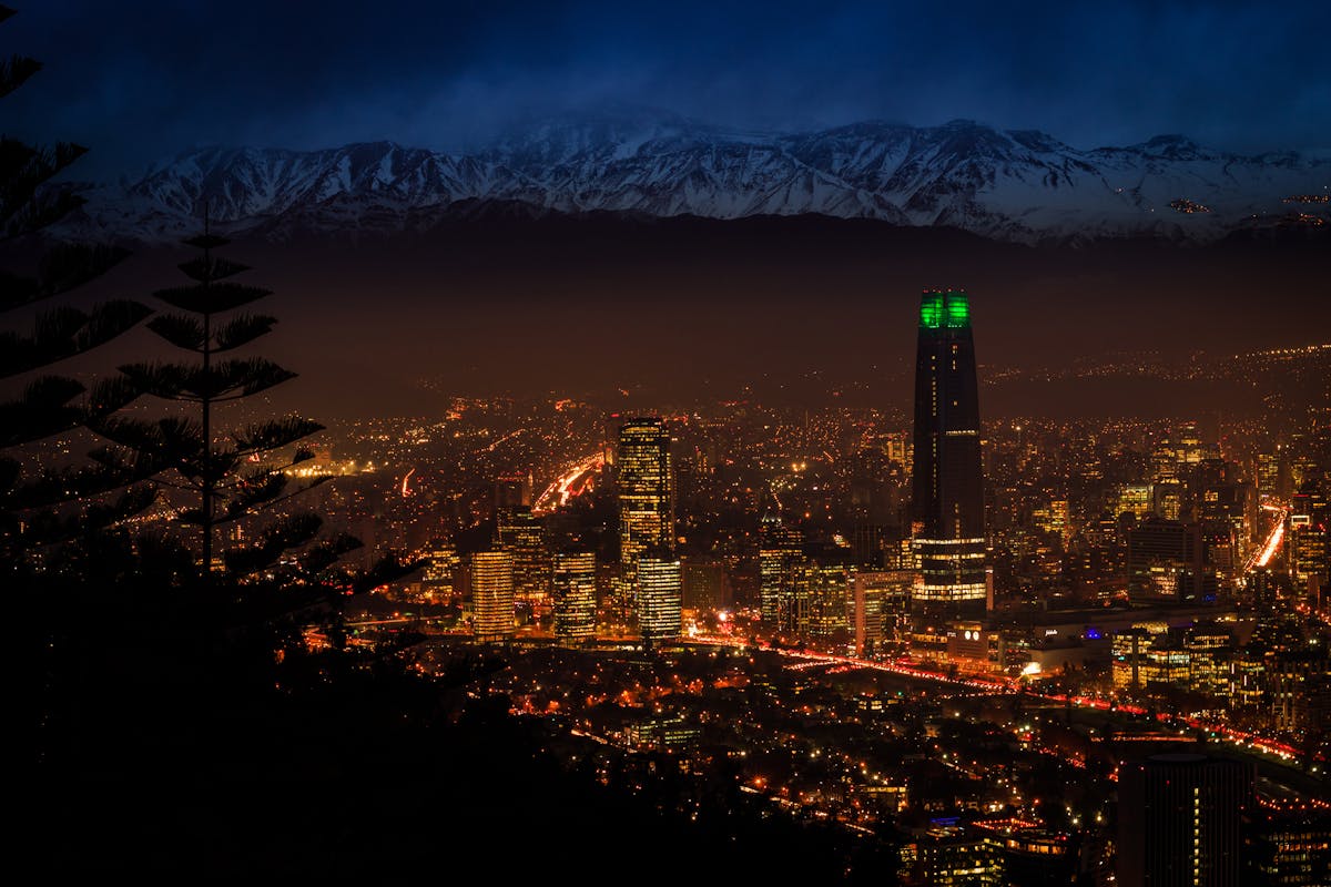 Santiago Chile skyline at night with Andes mountains in background