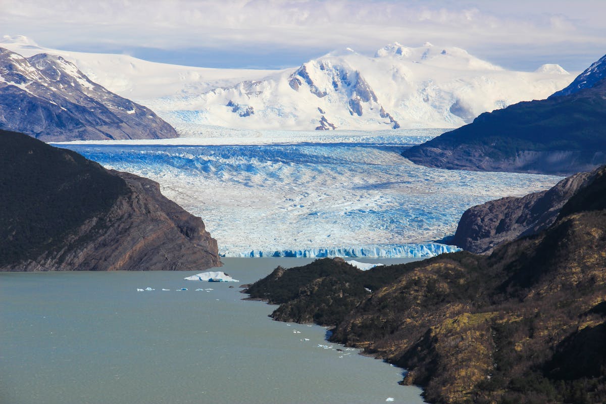 Aerial view of Grey Glacier in Torres del Paine National Park showing blue ice and turquoise water