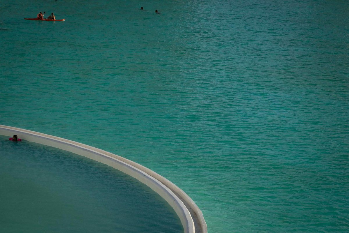 Turquoise waters and sandy coastline along the Chilean Pacific coast