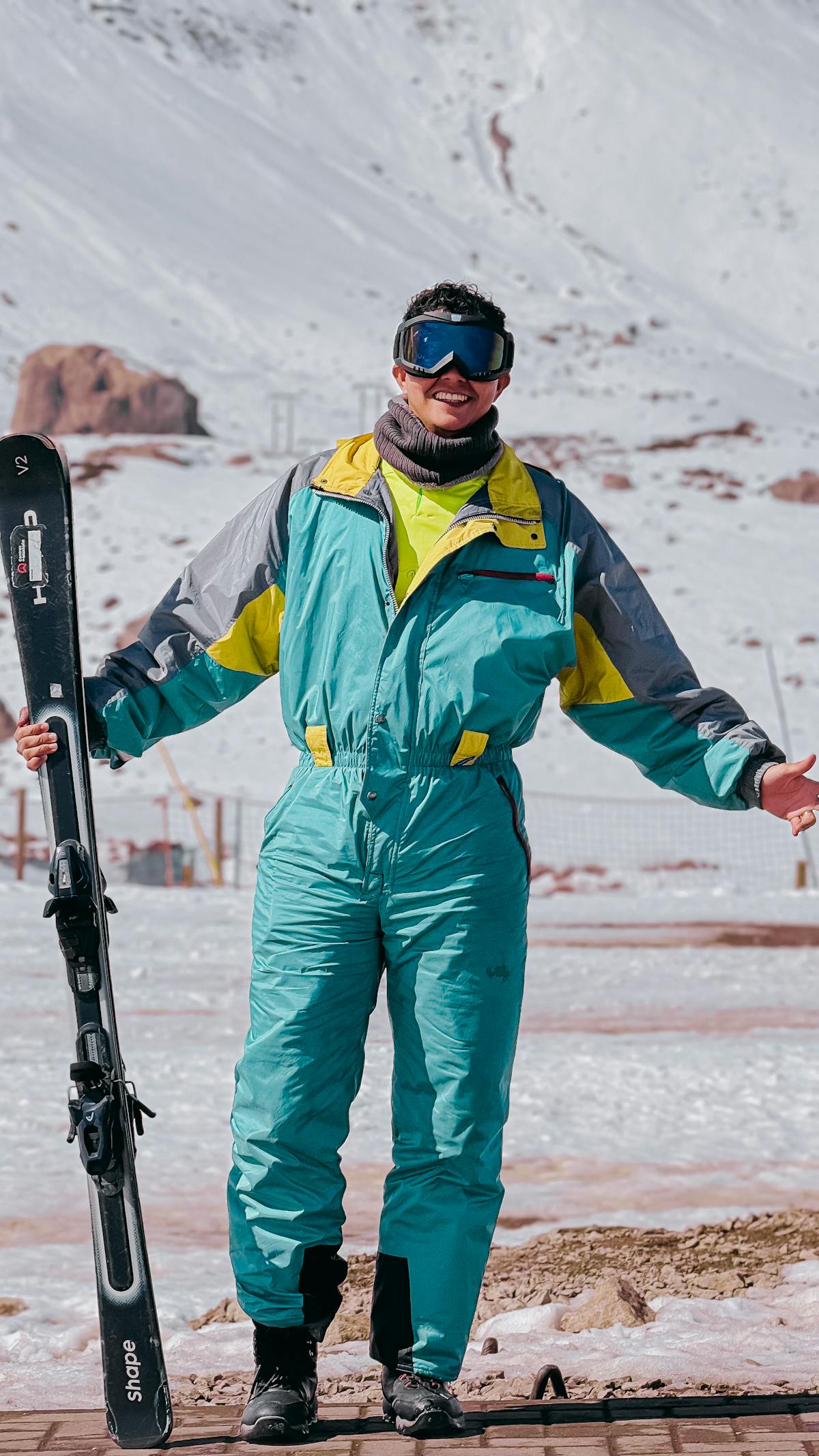Skier holding equipment in the snowy Andes Mountains near Santiago Chile