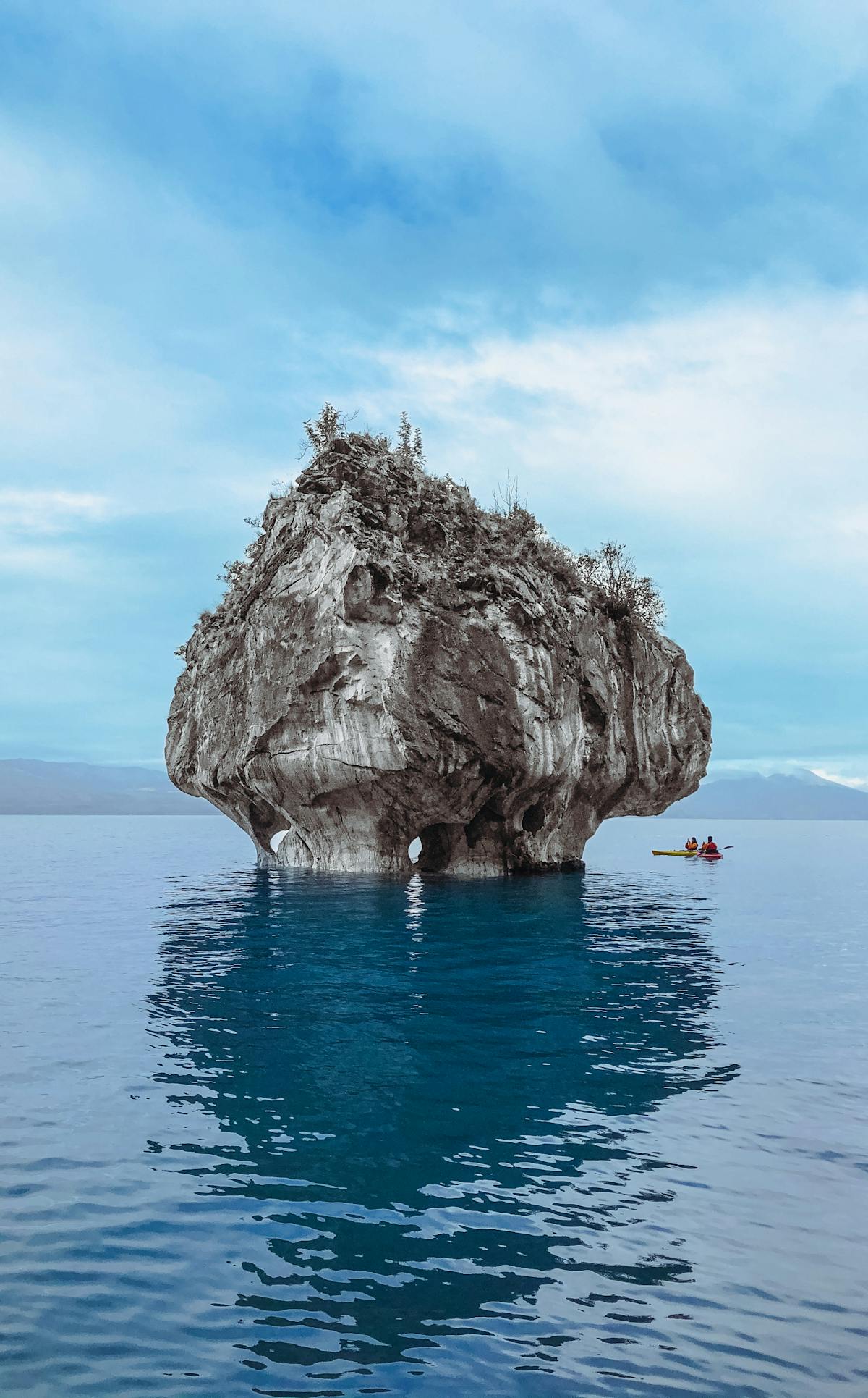 Marble rock formations rising from the turquoise waters of Lago General Carrera in Aysen Chile