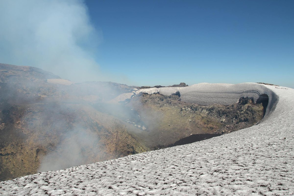 Villarrica Volcano crater emitting smoke and steam