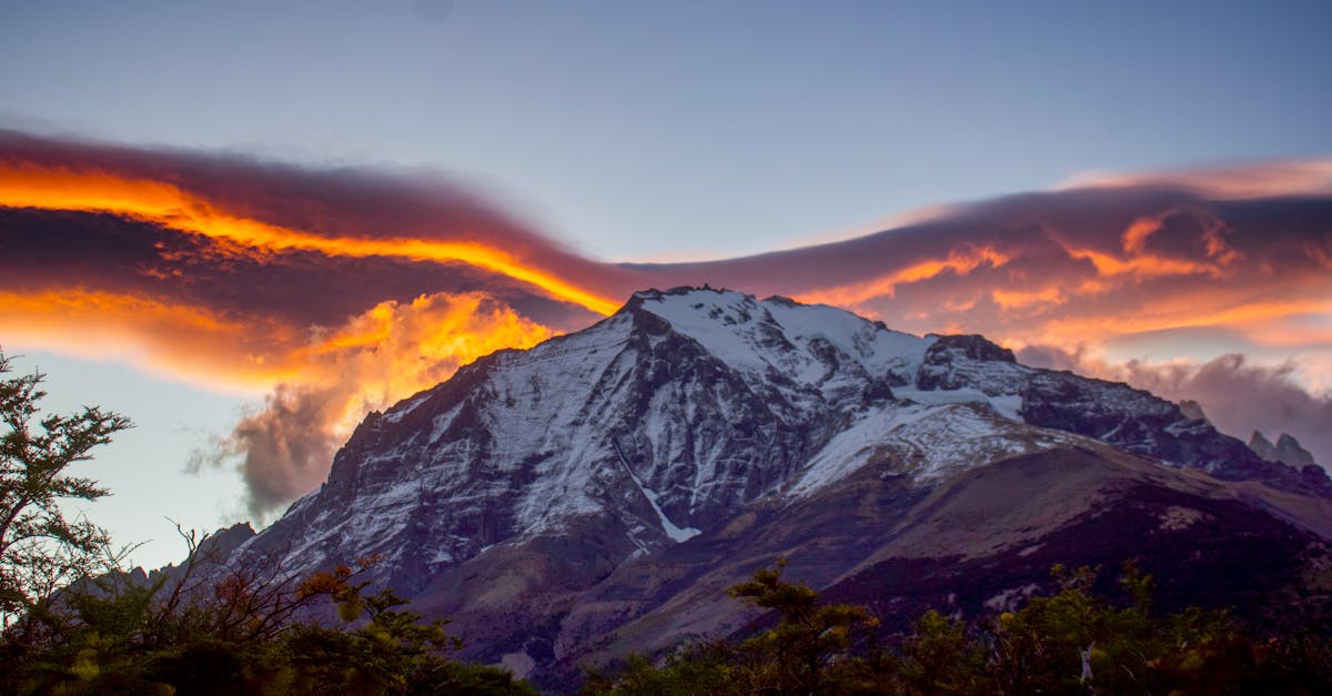 Dramatic sunset over mountains in Patagonia with orange and purple sky