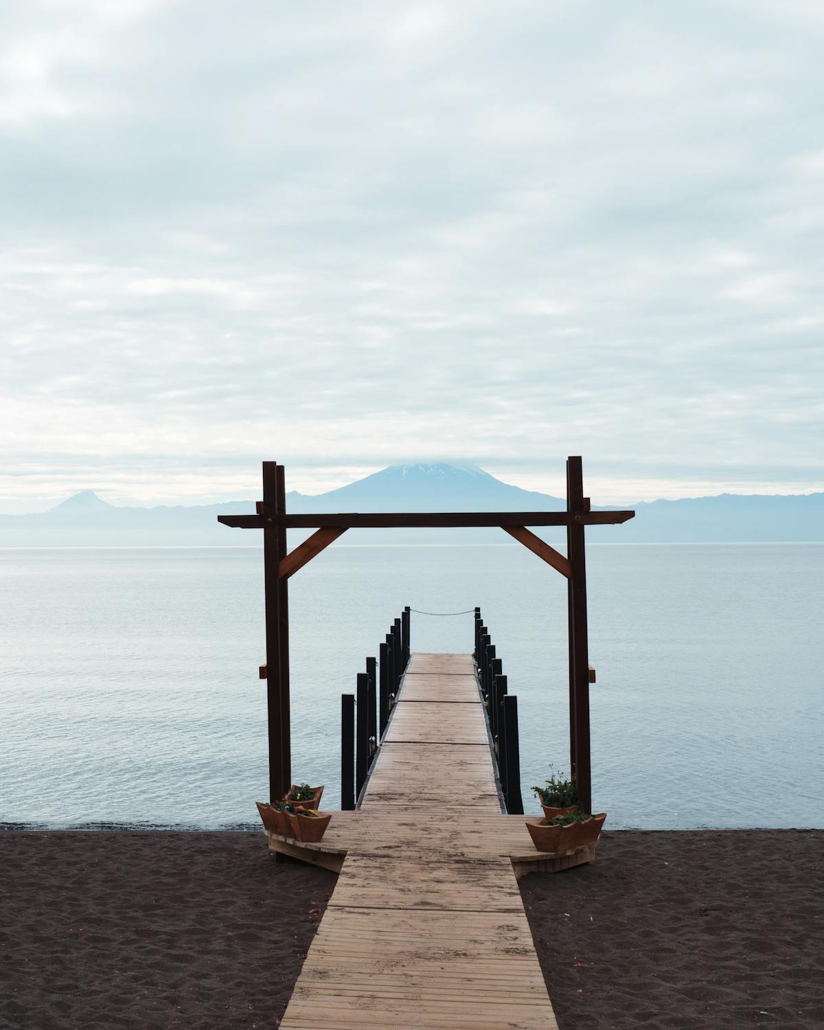 Wooden pier extending into Lake Llanquihue in Frutillar, Los Lagos, Chile