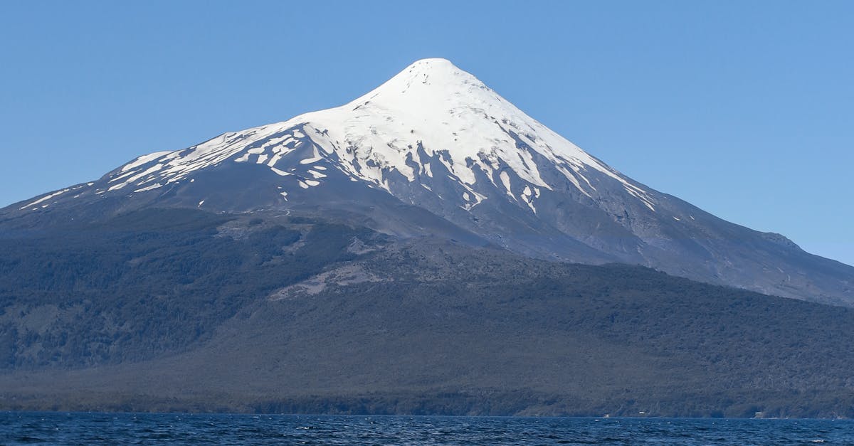 Snow-capped Osorno volcano reflected in the waters of Lake Llanquihue