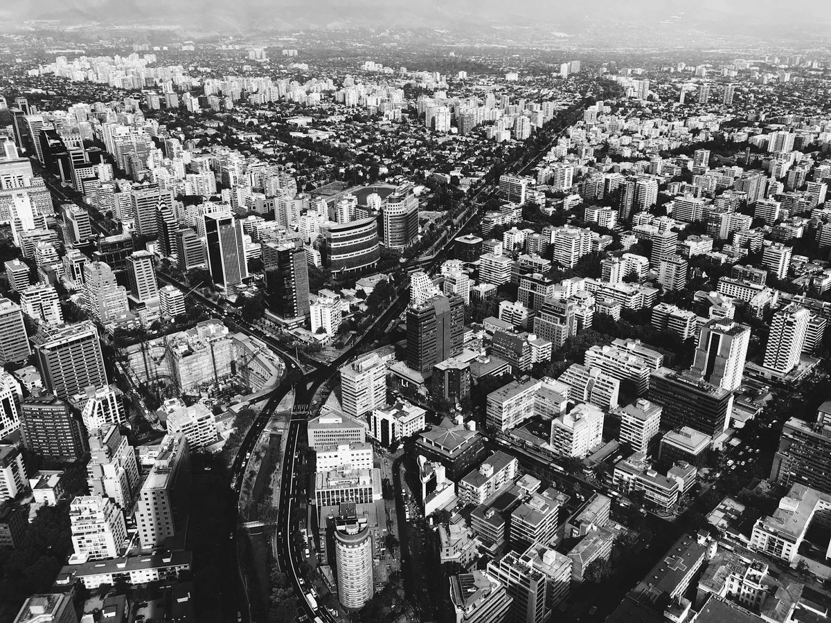 Aerial cityscape of Santiago Chile showcasing modern skyscrapers and urban architecture