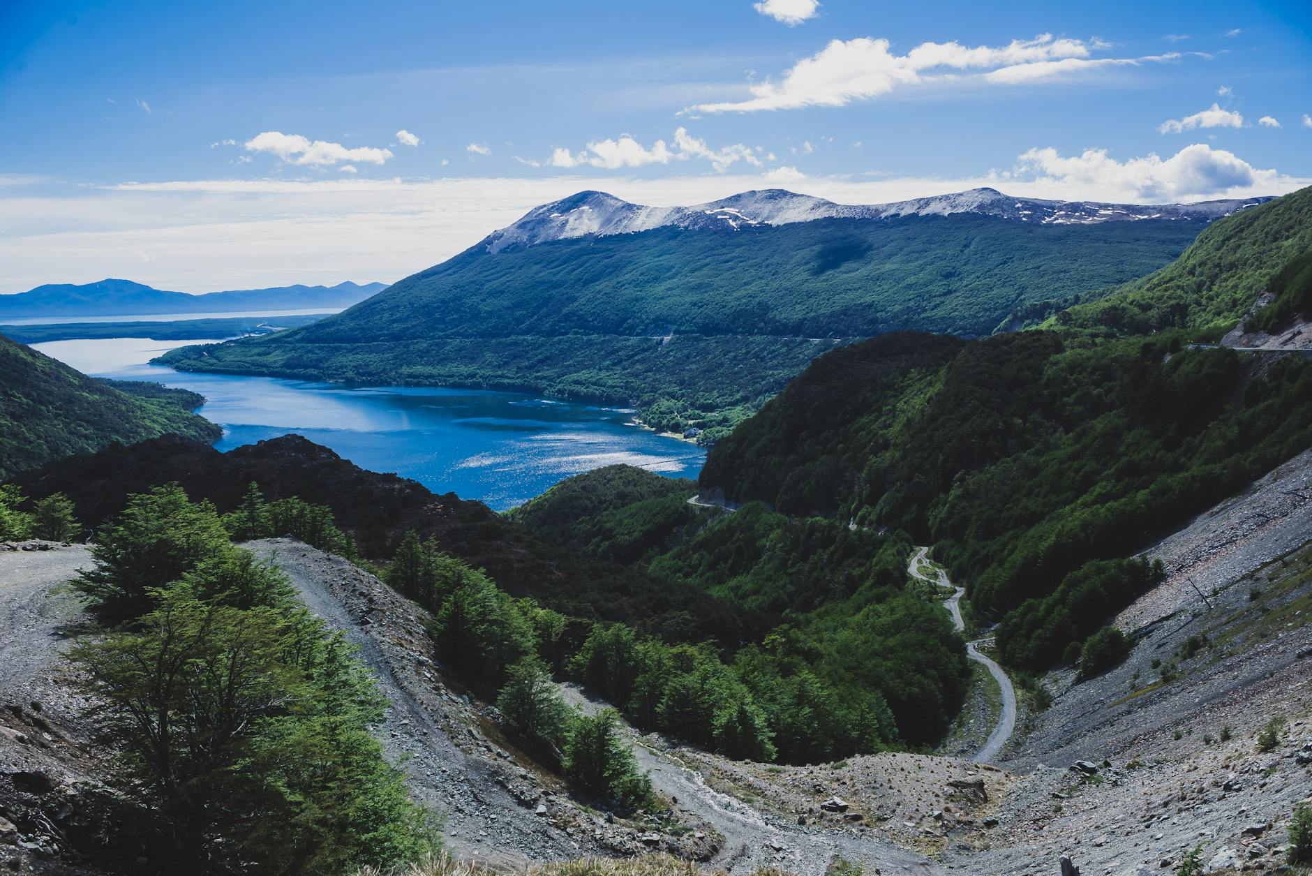 Mountain and lake landscape in Tierra del Fuego with sub-Antarctic forest and overcast sky