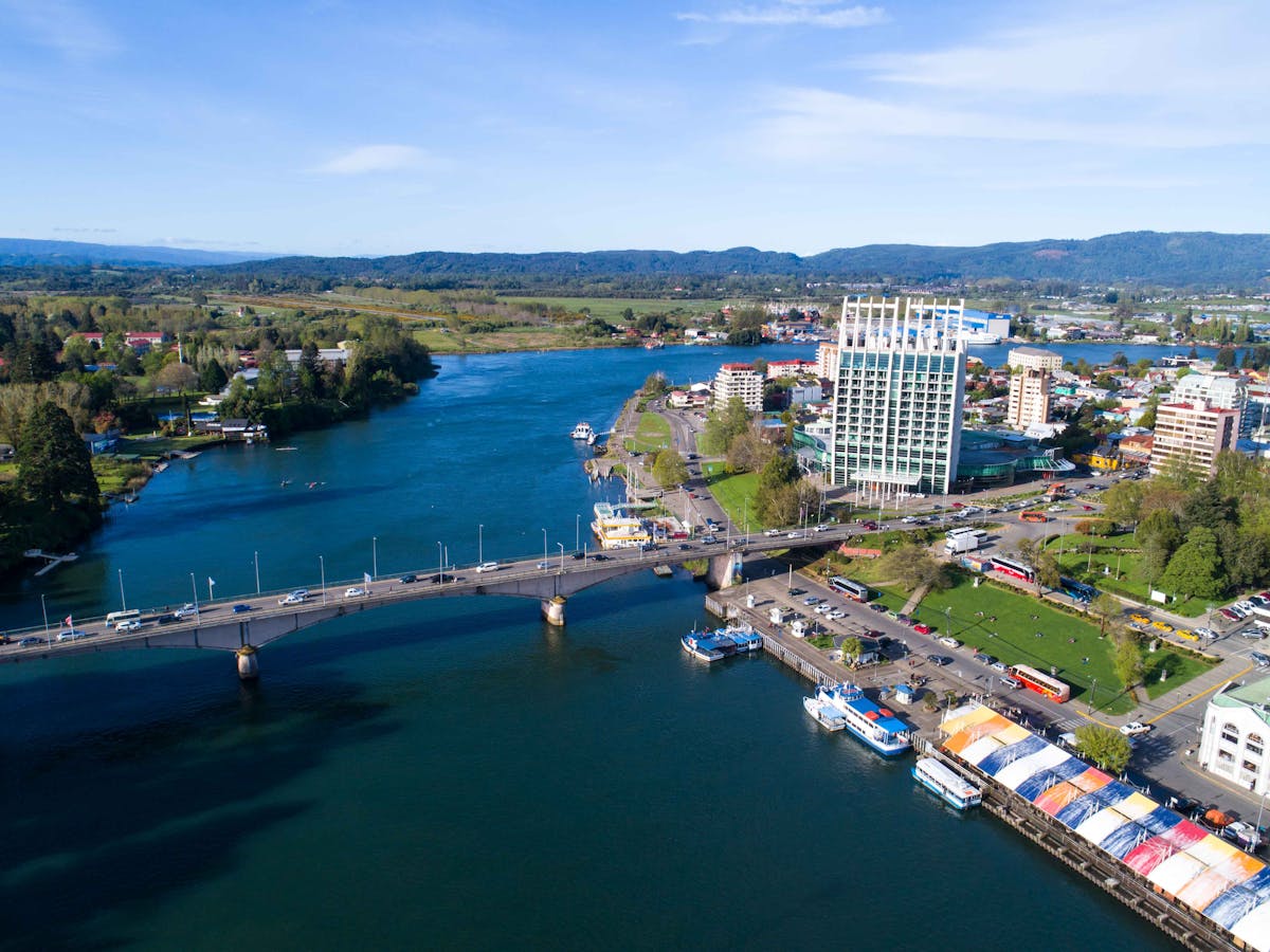 Aerial view of Valdivia showing the river, bridges, and urban landscape