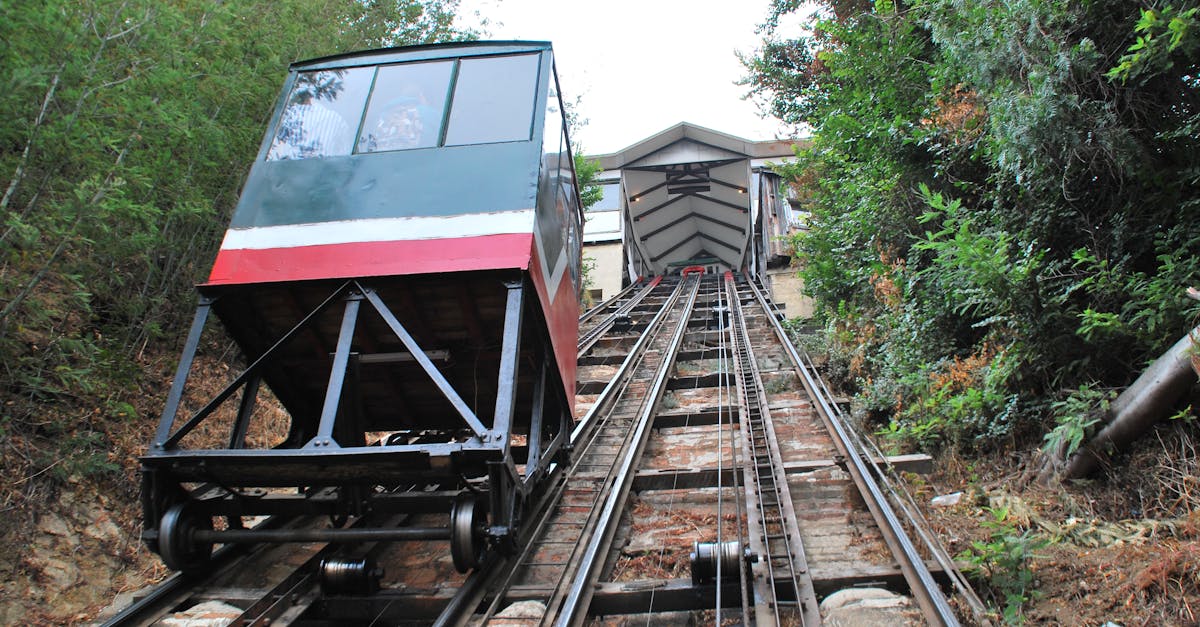 Historic wooden funicular ascending a steep hillside in Valparaiso Chile