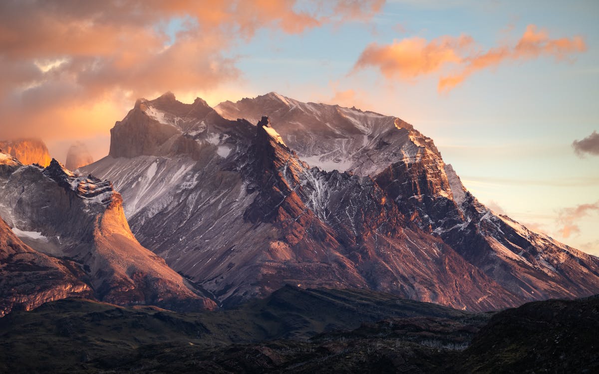 Torres del Paine mountains at sunset with snowcapped peaks